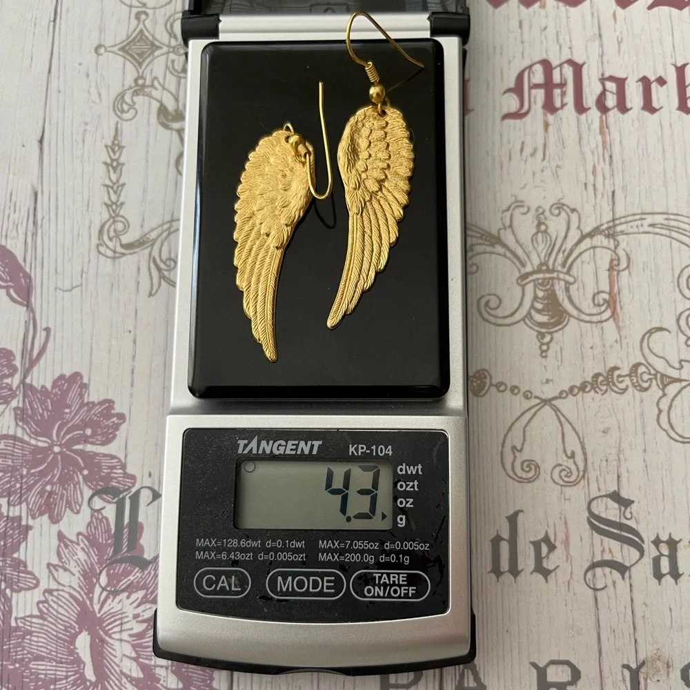Gold washed brass angel wings drop earrings - Picture 4 of 6